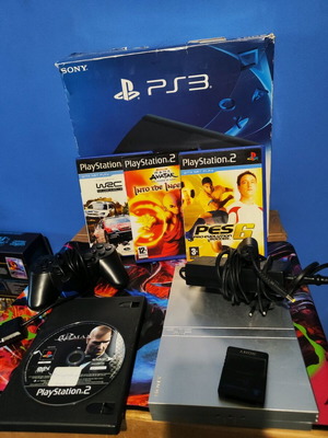 PlayStation 2 Slim сребрист употребяван с контролер, карта памет и 4 игри