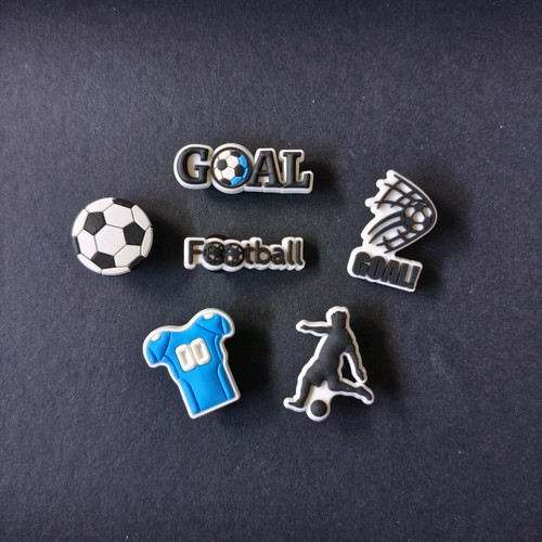 Crocs charms football set like new, black and turquoise
