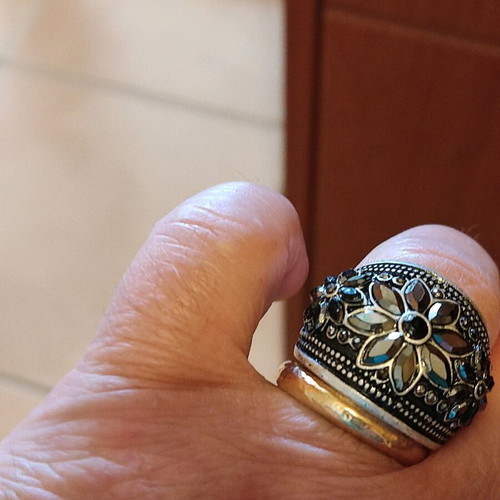 Silver-colored ring with stones like new