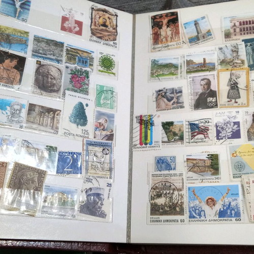 Stamps like new, collectible with two albums in storage box