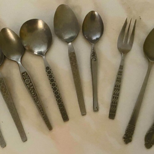 Vintage cutlery set used, 9 pieces with decorative designs