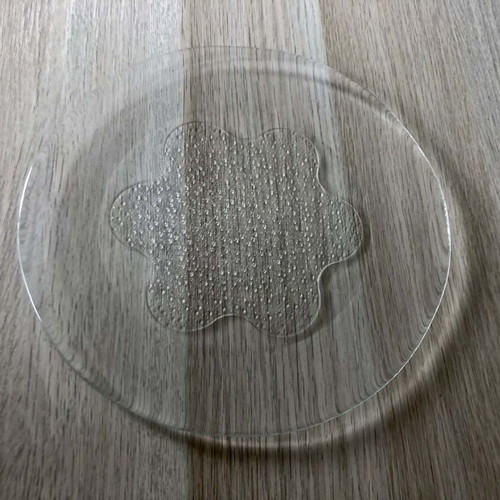 Glass serving platter like new with embossed design