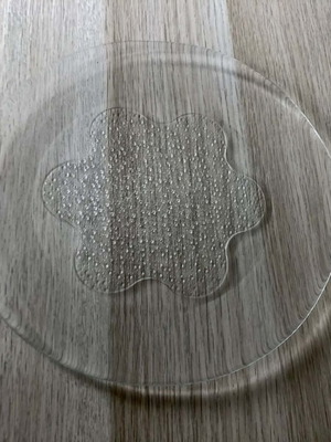 Glass serving platter like new with embossed design