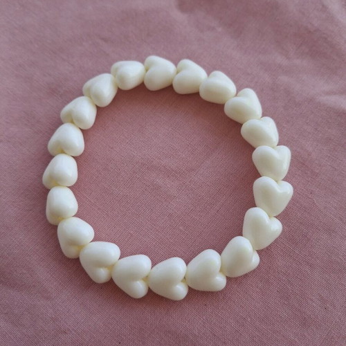 Bracelet with cream heart beads on elastic cord made to order