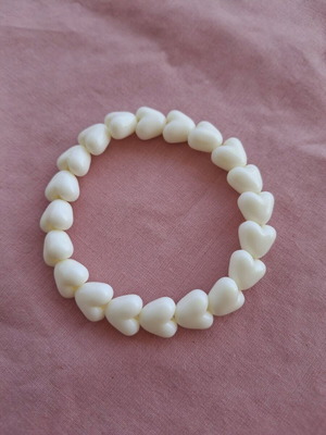 Bracelet with cream heart beads on elastic cord made to order