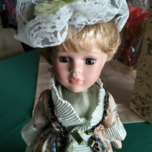 Vintage porcelain doll new in packaging