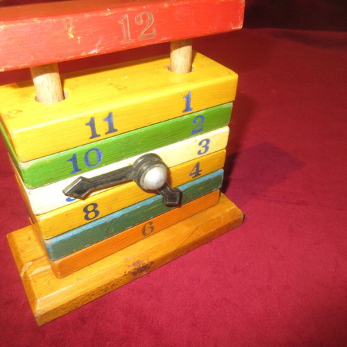 Wooden toy clock coil used 70s