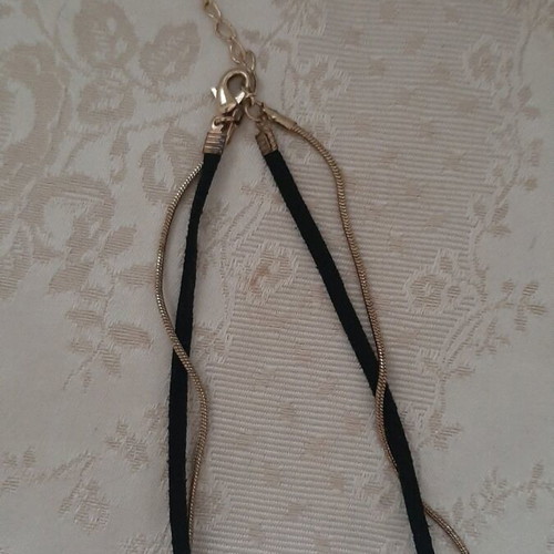 Necklace new with studs and long cord