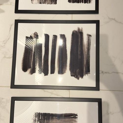 Pictures with frames black and white 50x70 used, set of 3 from Ikea