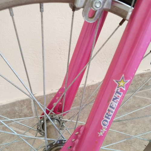 Girls BMX bike used with training wheels