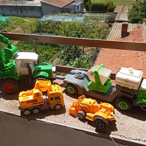 Children's construction and specialized toy trucks set of 4 used