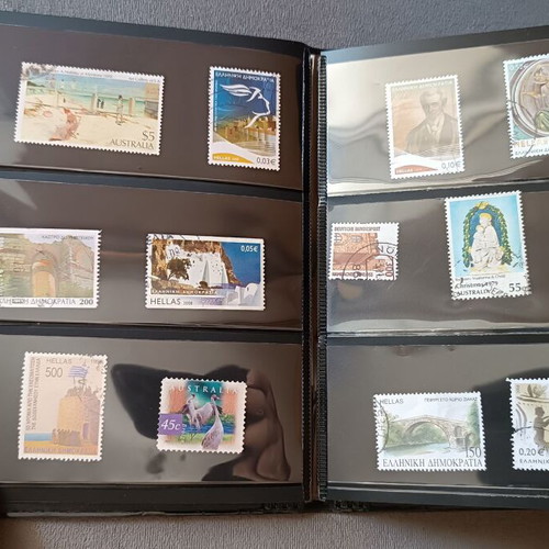 Stamp album with 120 stamps like new, Greece Australia Cyprus Germany America Canada