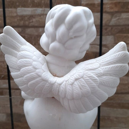 White angel figure ceramic used