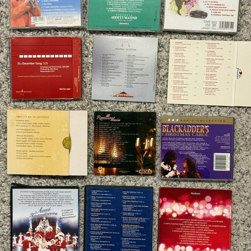 Large Christmas pack 12 CDs and DVDs like new with festive music and movies