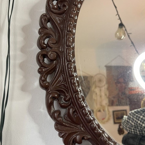 Vintage oval wall mirror with embossed frame