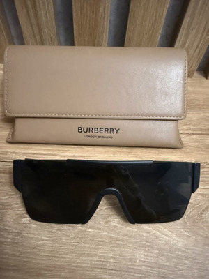 Burberry women's mask used with box and leather case