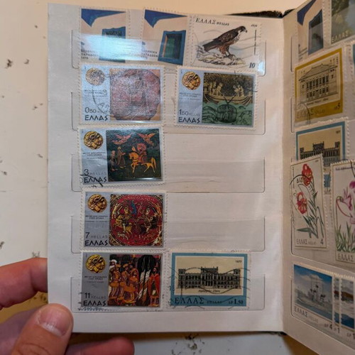 International Stamp Collection album with large vintage Greek and foreign stamps lot