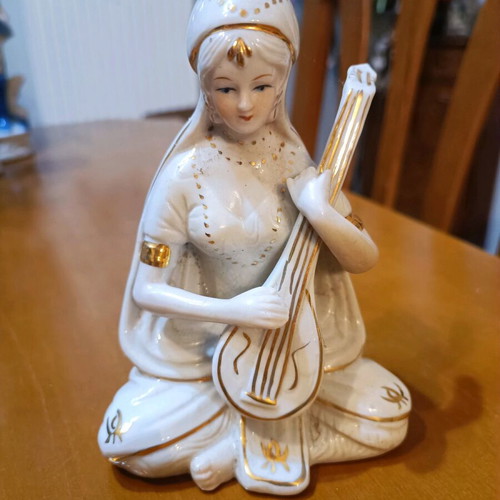 Porcelain statue of Indian girl playing sitar like new, vintage