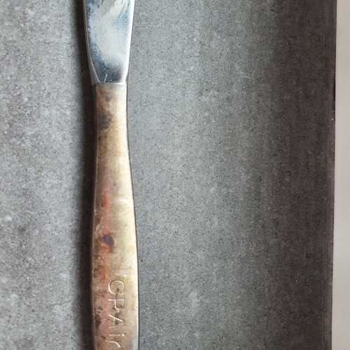 Collectible airline company spoons and knife used