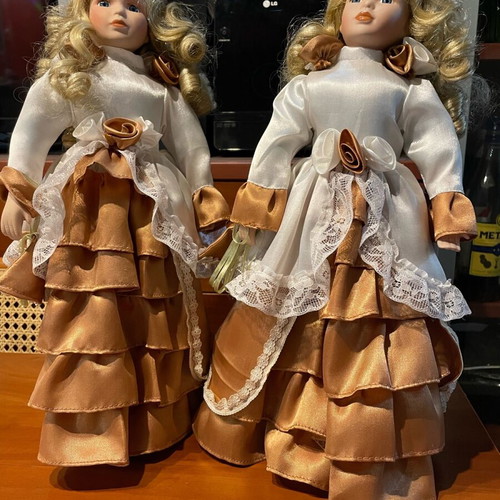 Vintage porcelain dolls like new