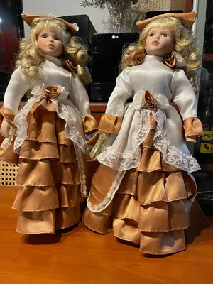 Vintage porcelain dolls like new