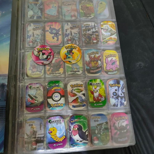 Pokemon GO The Original Metal Tags Album like new with 270 metal tags