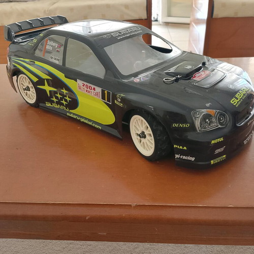 Gas-powered remote control Subaru racing car like new