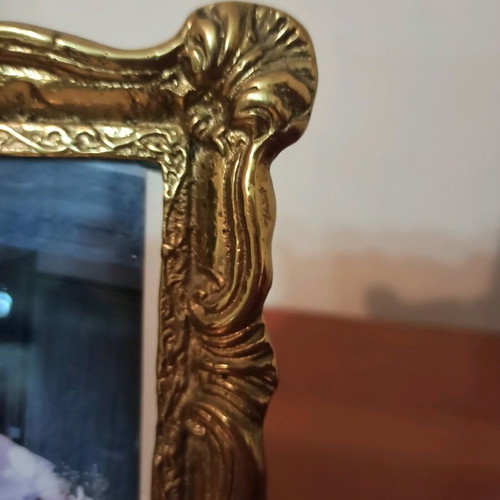 Bronze frame with ornate carvings like new