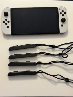 Nintendo Switch OLED σαν καινούργιο με 4 χειριστήρια, 3 παιχνίδια και κάρτα 256GB