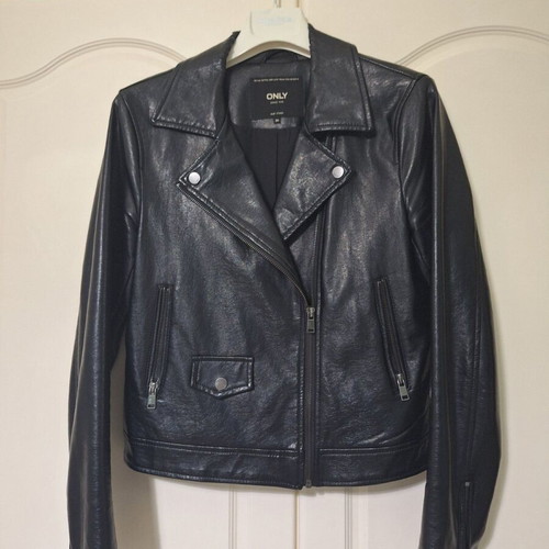 Only black biker jacket made of faux leather with silver details used