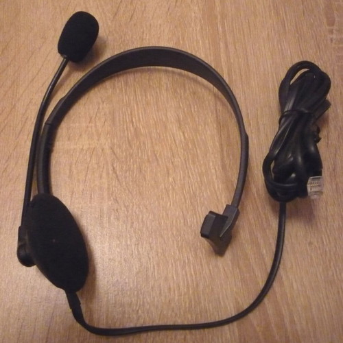 Headset for landline phone with classic ear clip like new