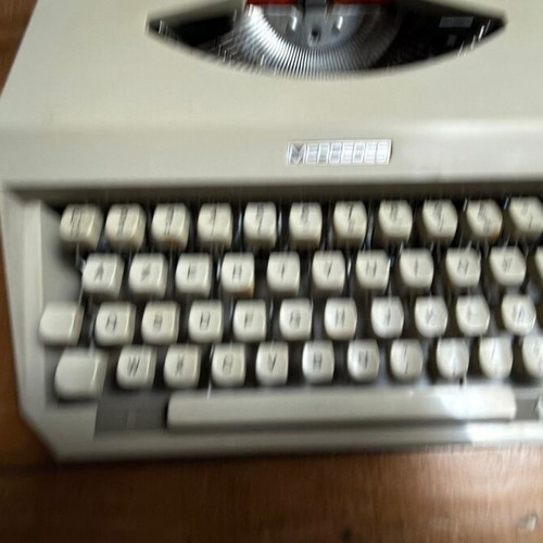 Mercedes vintage mechanical typewriter with original case
