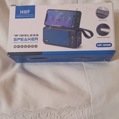 Wireless speaker used with flashlight and solar charging