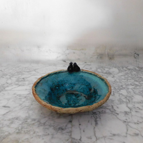 Decorative handmade ceramic plate with turquoise glaze, vintage, like new