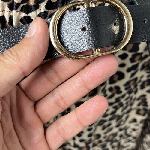Leopard print pants with leather belt and gold buckle like new