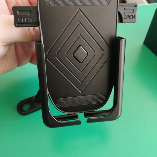 Metal phone holder for motorcycles like new, screws on mirror