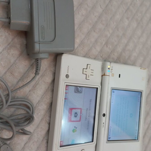 Nintendo DS used with original charger, no stylus