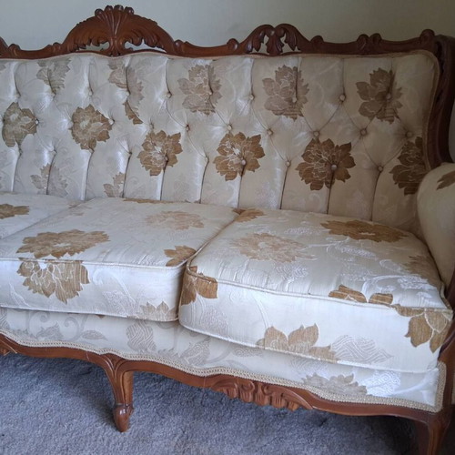 Vintage four-seater sofa refurbished with new fabric