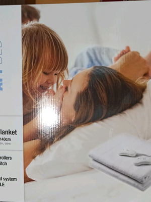 Electric under blanket new, sealed in box