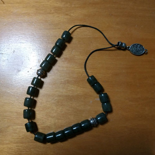 Worry beads like new with carved intermediate stones