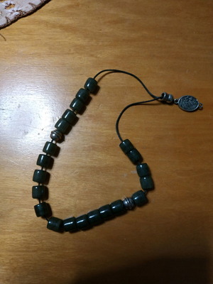 Worry beads like new with carved intermediate stones
