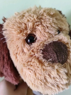 Moving plush dog toy