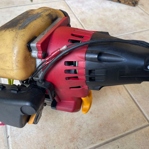 Homelite F3055 Petrol Lawn Mower used with accessories