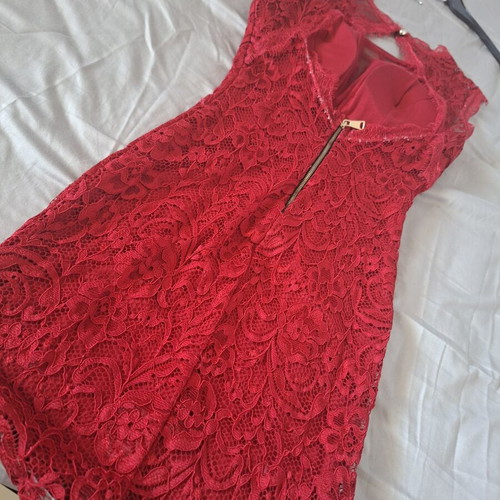 Red embroidered dress with chest transparency and open back, like new