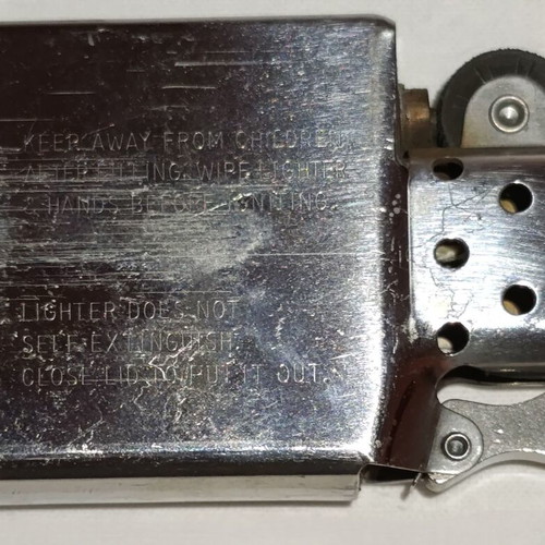 Zippo Colossus of Rhodes lighter used, laser engraved, made in USA