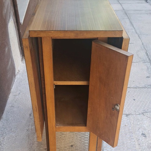 Dining table used with 2 drop-leaves and cabinet with shelf