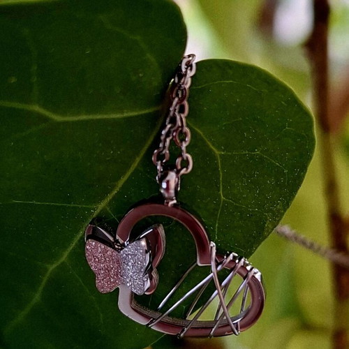 Heart necklace with 3D butterfly and adjustable chain, like new