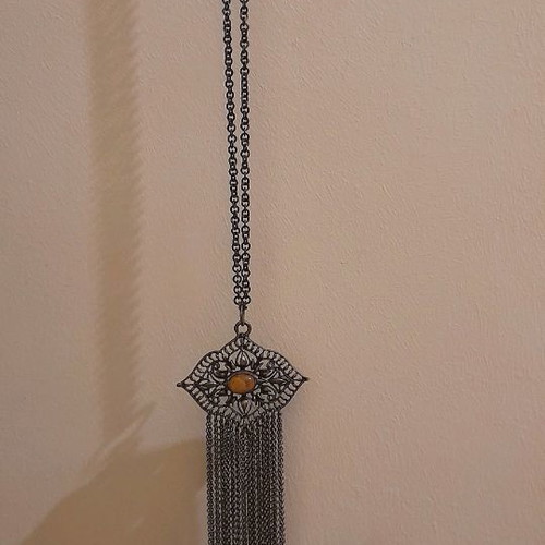 Necklace used, metal pendant