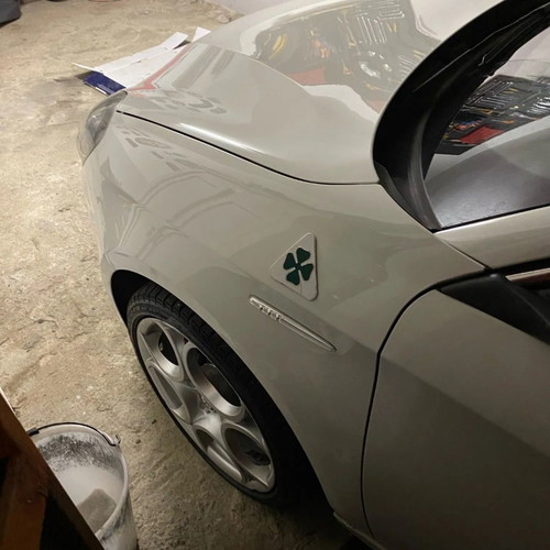 Alfa Romeo QV wing clovers new, aluminum pair