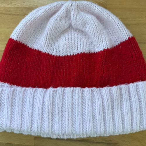Knitted hat used, pink and red, 70% wool